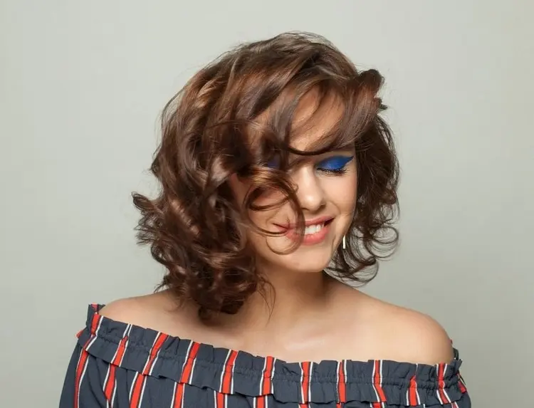 Asymmetrical-bob-with-curls-for-a-cool-look