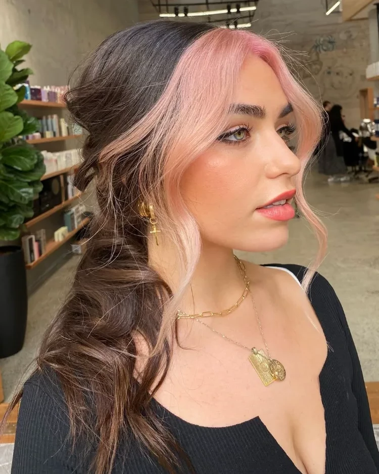 Hair color spring 2023 black hair with pink highlights