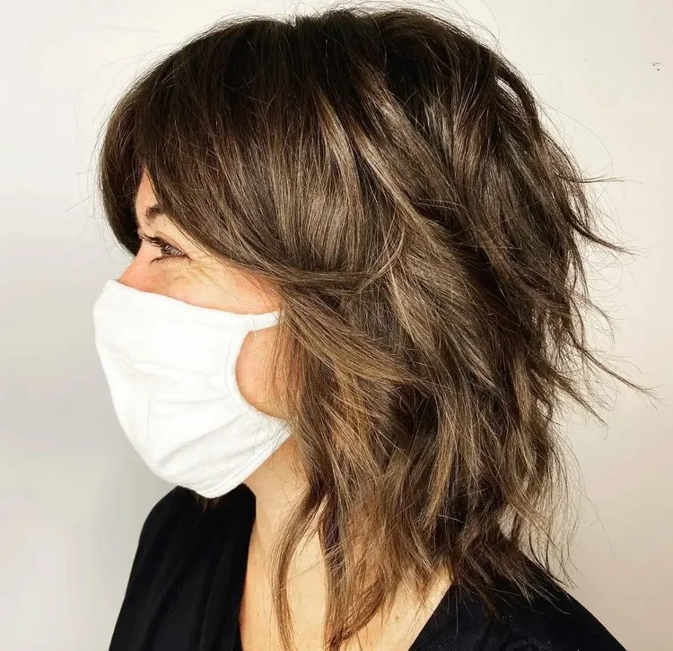 Mid-length cut with gradient curtain fringe