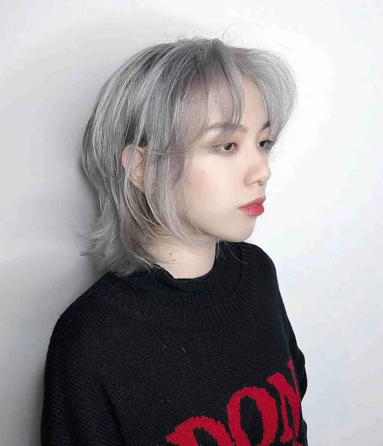 Modern short hairstyle in ash grey