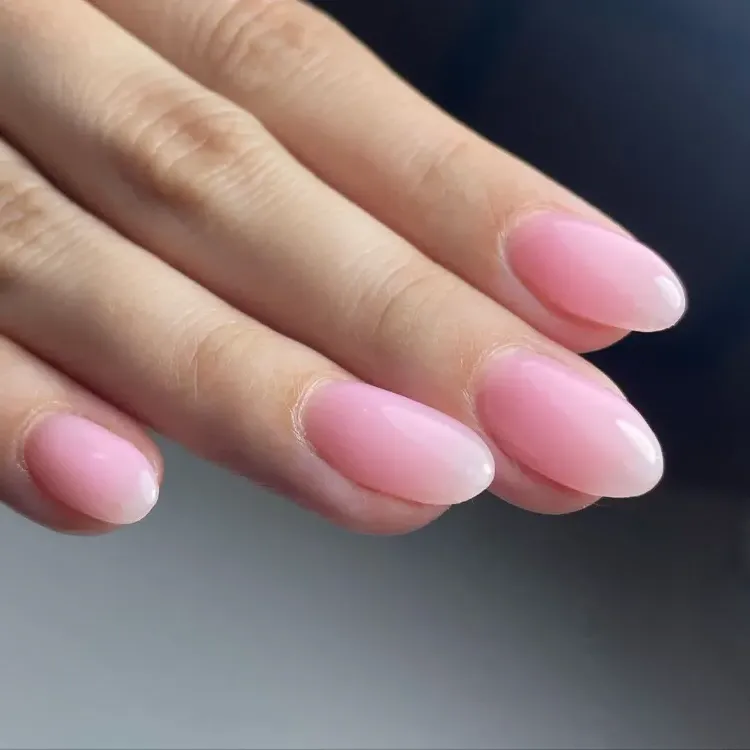 Pastel pink nail polish trend lip gloss nails trend-2023