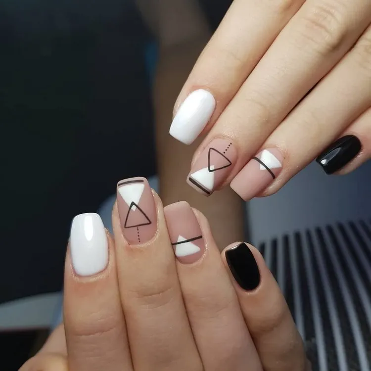 Stylish French manicure with geometric decoration