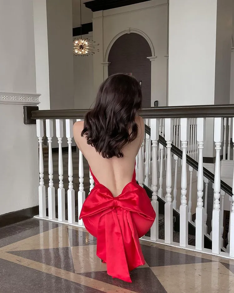 backless red dress with a huge bow on the back valentine's day outfits