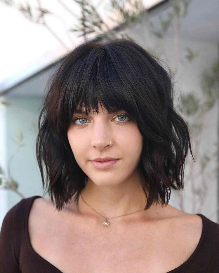 black chunky bob with bangs tousled look