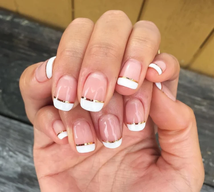 classic white tips french manicure gold stripe