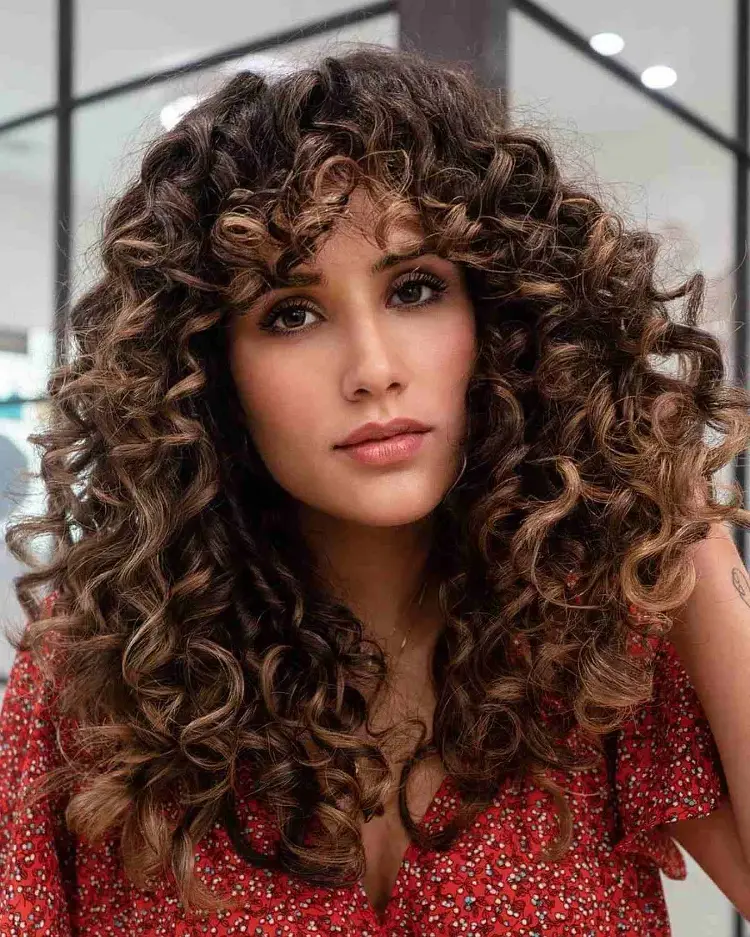 curly fringe tips haircut trends 2023 long curtain bangs