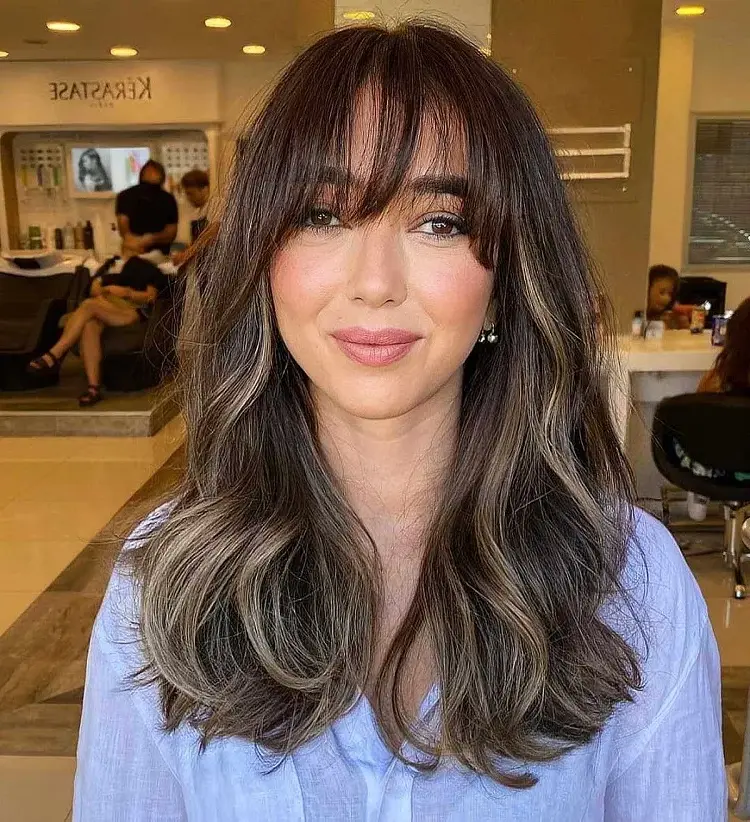 curtain bangs how to wear them in 2023 styling ideas haircut trends (1)