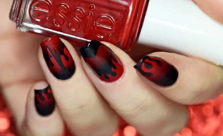 dark anti Valentine's Day nails idea symbolizing blood and pain