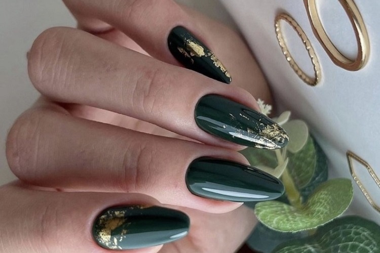 emerald green nails with gold decorations
