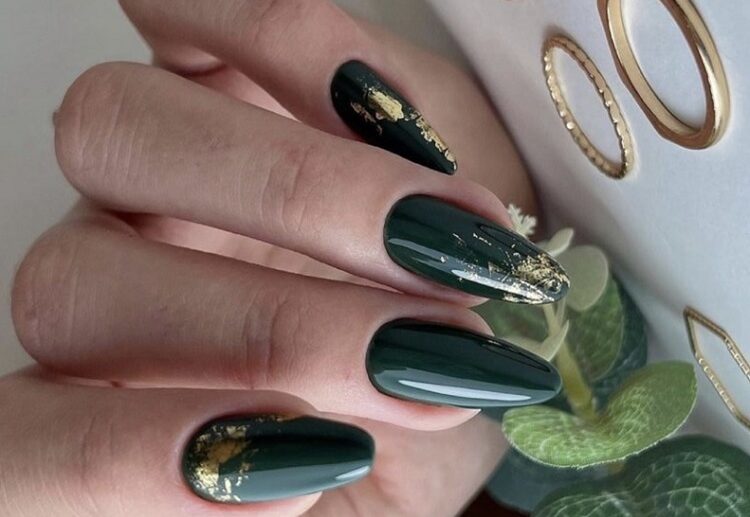 emerald green nails with gold decorations