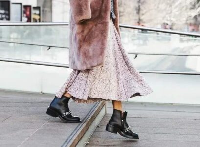 fall-winter 2023 fashion trend faux fur coat is suitable for all types of skirts