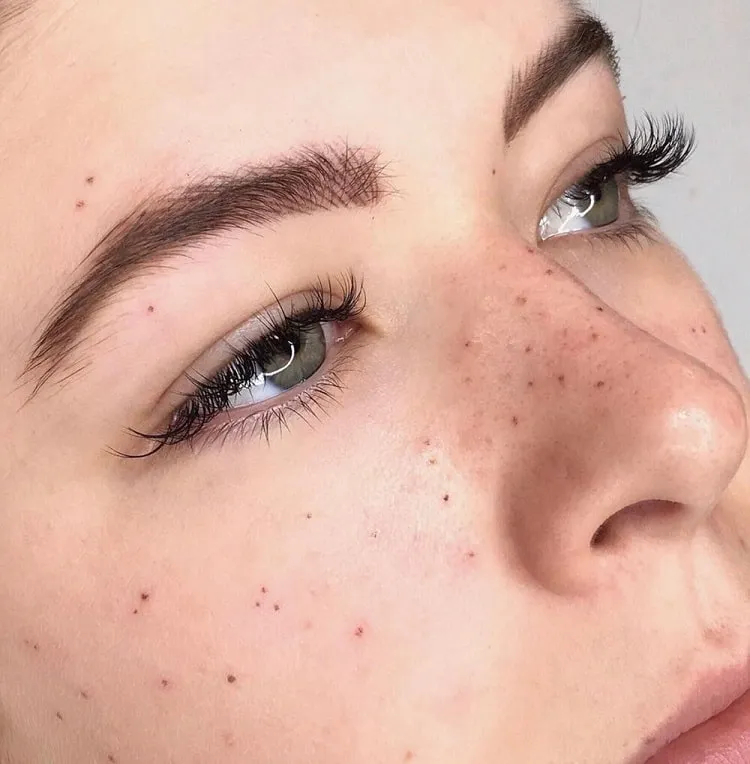 faux-freckles-face-tattoo-for-women