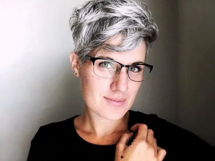 gray hair color trends 2023 pixie cut in salt and pepper hair color