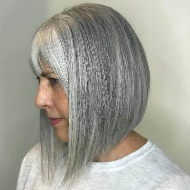 inverted bob with bangs hairstyle for grey hair women over 50