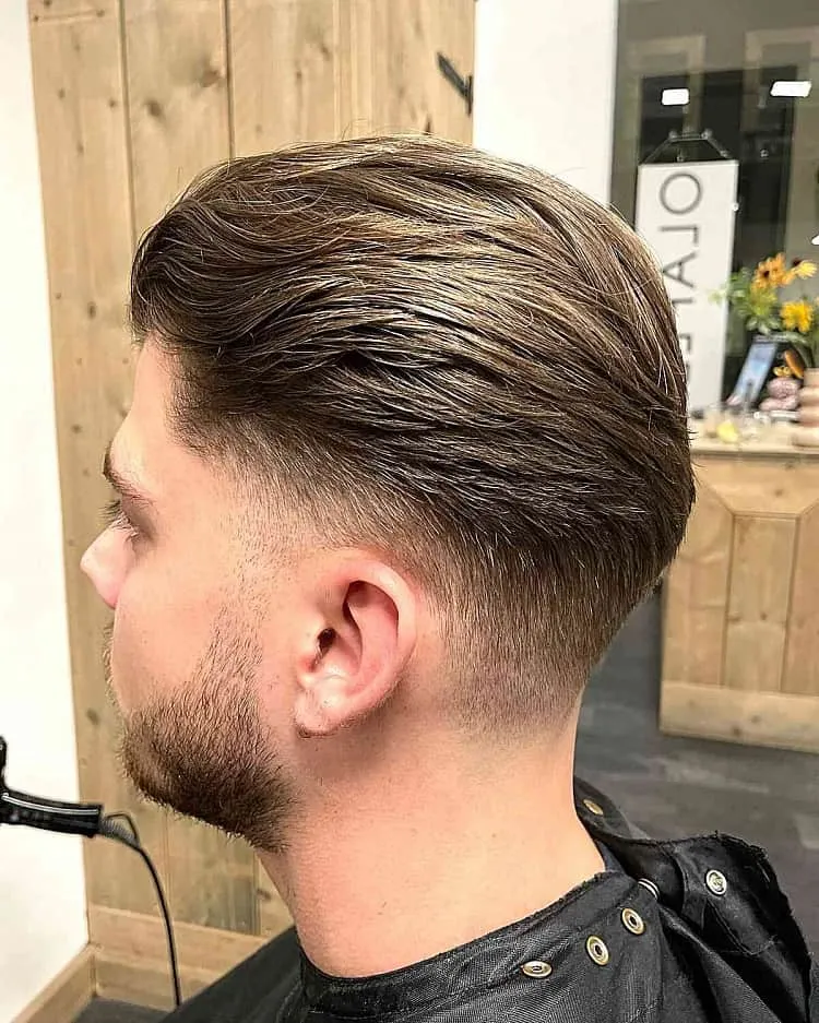 low-tapered-fade-and-slick-back-style-2023-hair-trend