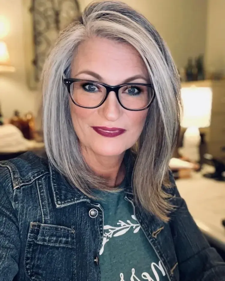 medium-length grey hairstyles for women over 50 with glasses