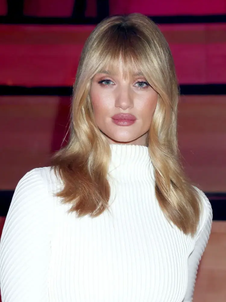 medium-length-hair-blonde-hair-with-curtain-bangs-tapered-woman-trend-cut-colour-2023