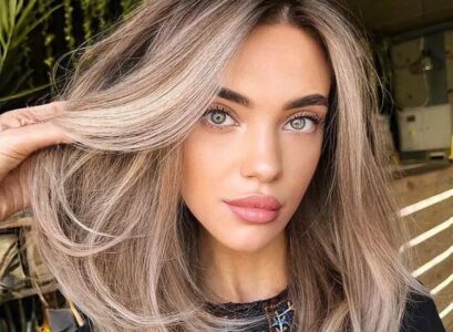 medium length layered hair platinum blonde curve cut