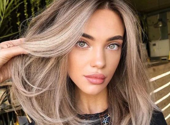 medium length layered hair platinum blonde curve cut