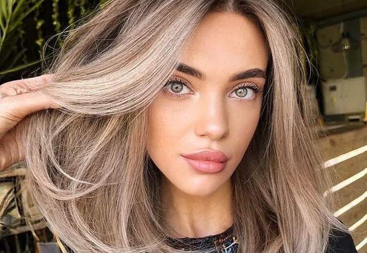 medium length layered hair platinum blonde curve cut