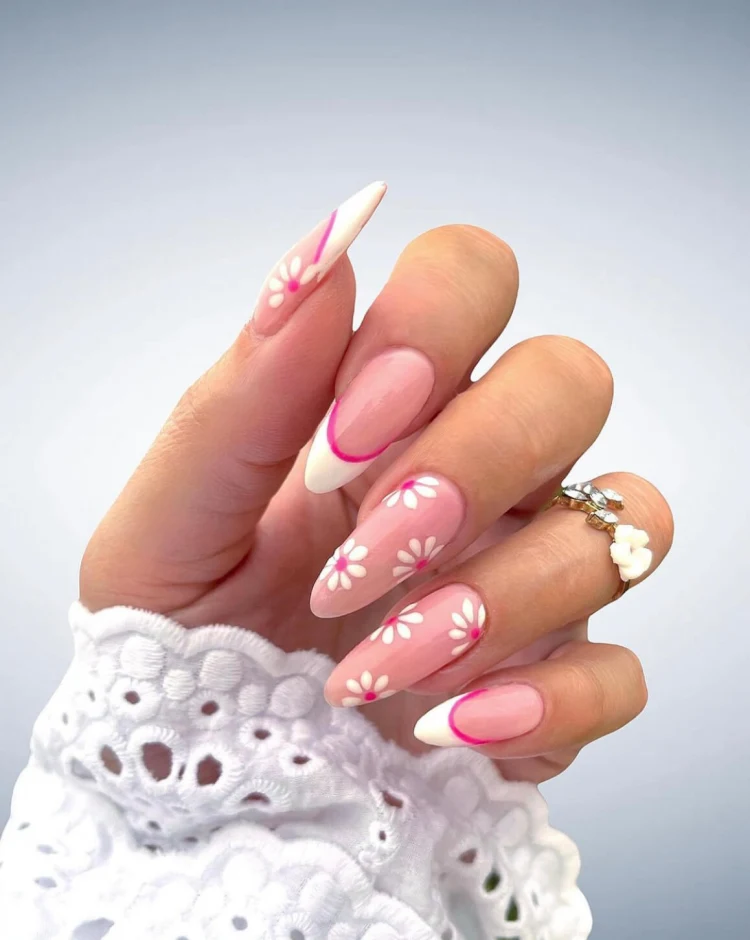 pink nail design with flowers white different shades of pink