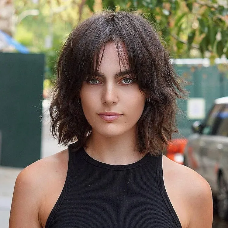 shaggy-bob-cut-with-curtain-bangs-brunette-hair