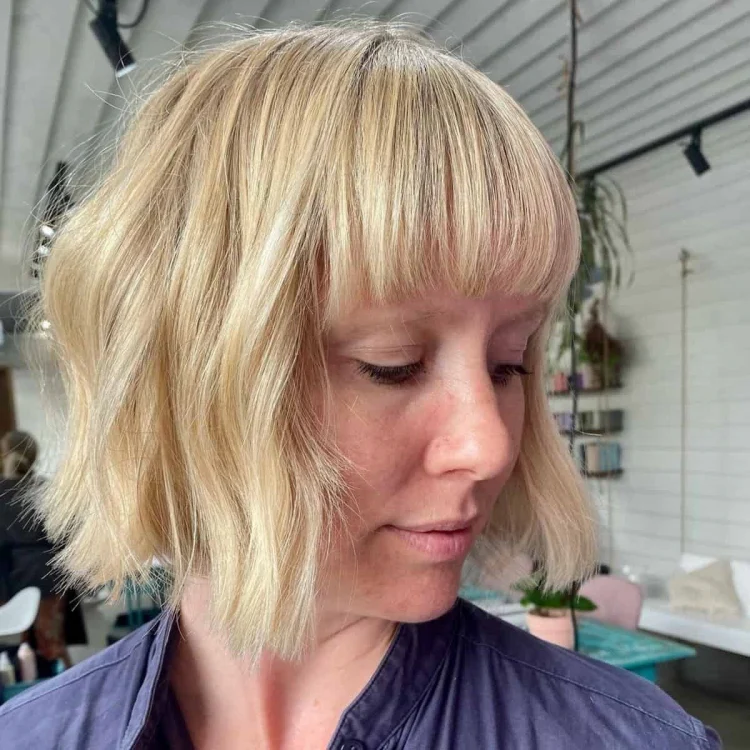 soft edges nice blonde bob hairstyle with blunt bangs