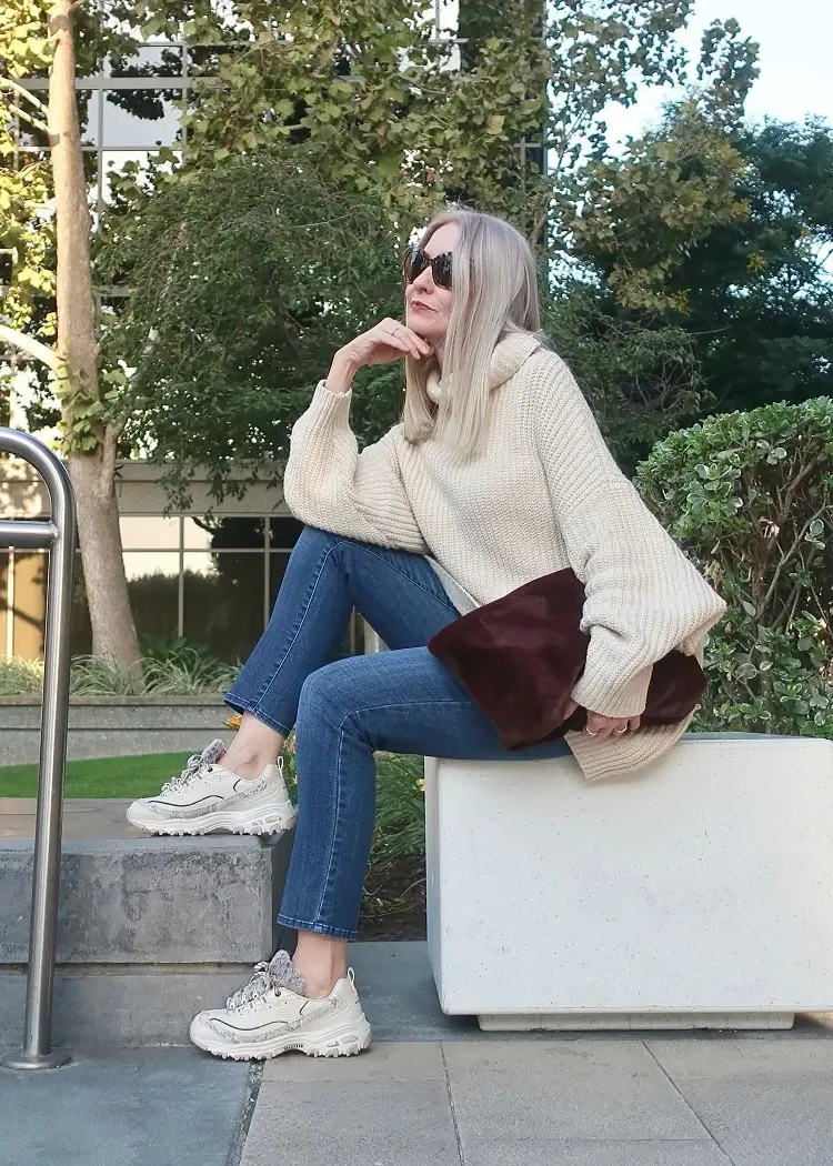 wear sneakers with jeans and sweater at 60