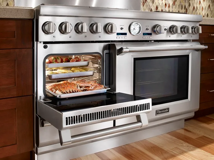 Cleaning-off-stainless-steel-stove-bright-and-shine