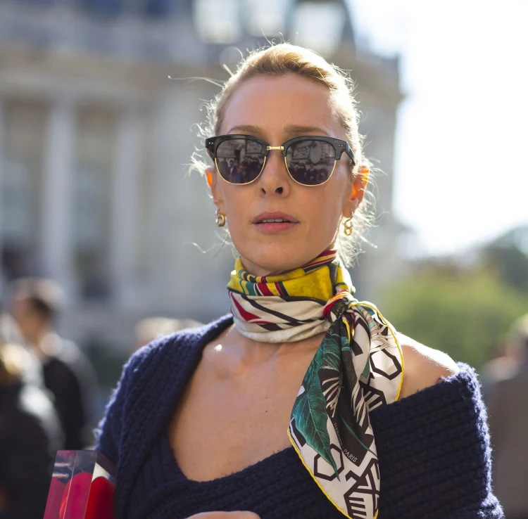 french girl outfit idea with colorful scarf around the neck sunglasses