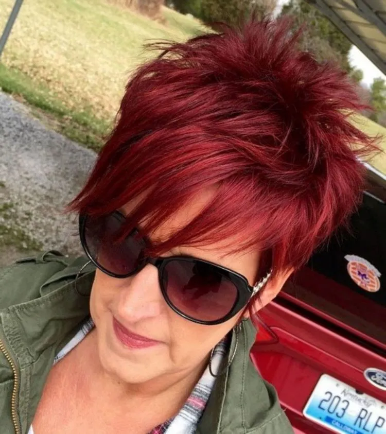 Red short and spiky pixie haircut with volume on top