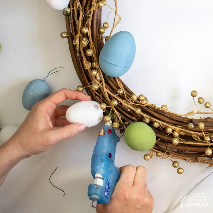 assembling diy easter egg wreath hot glue gun