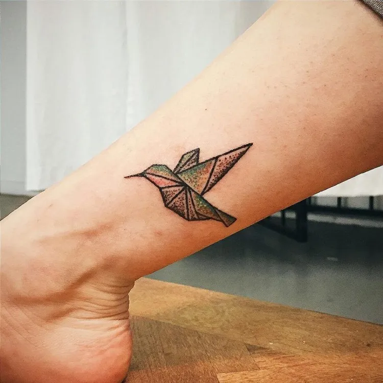 aztec hummingbird tattoo lower leg