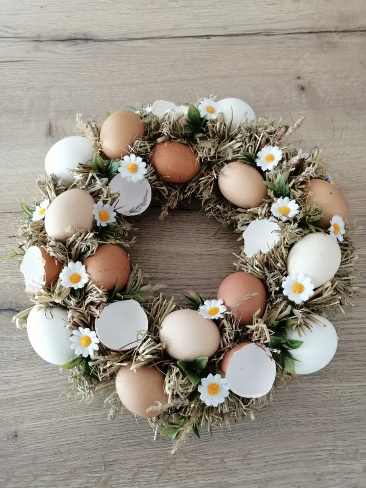 beautiful egg wreath idea with flowers and greenery