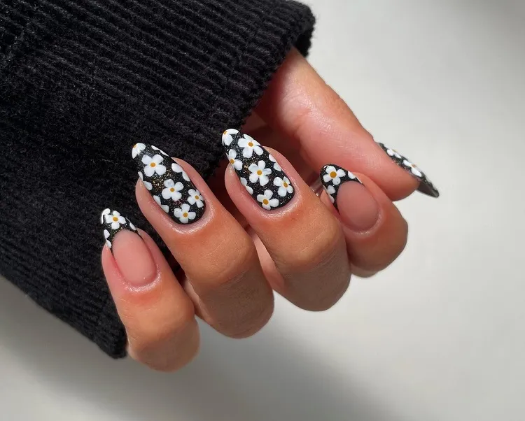 black spring nails 2023 with flower decorations
