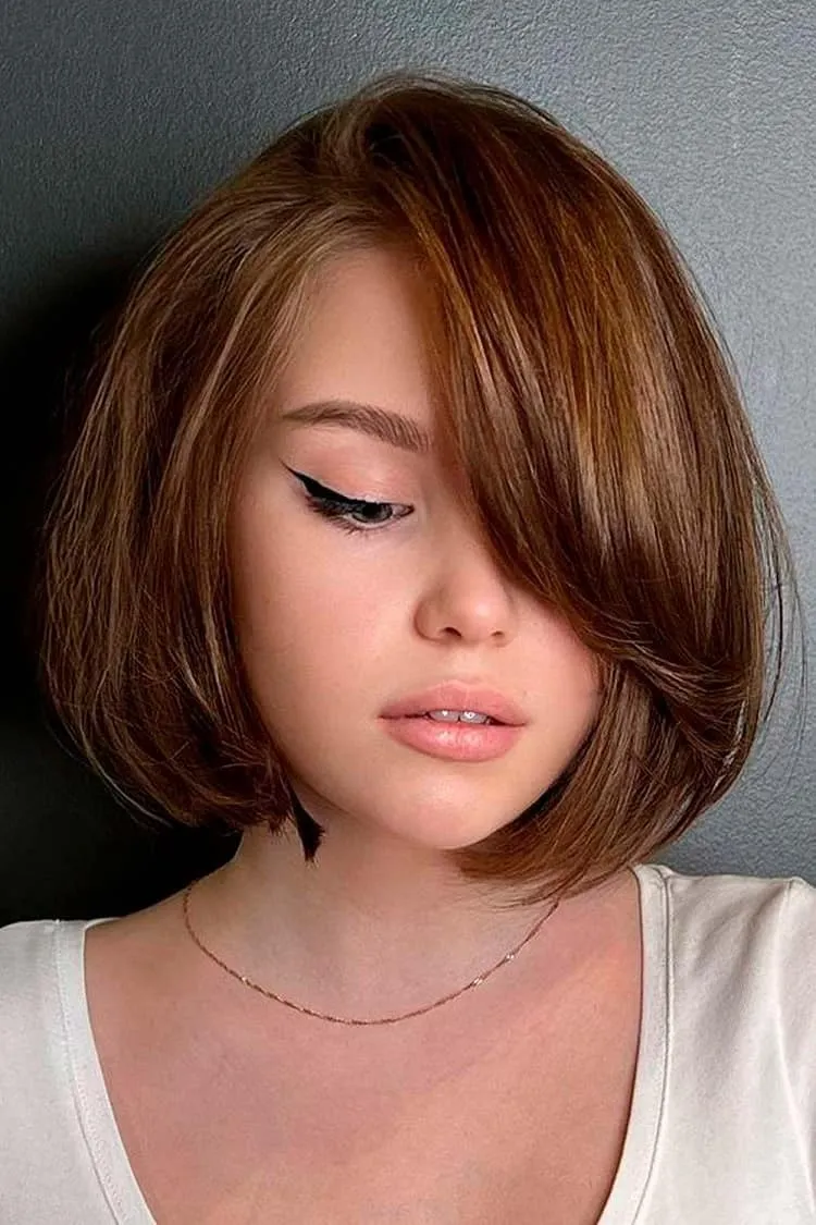 bubble haircut with side fringe