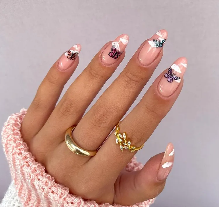 cloud nails with butterfly decoration cute ideas for manicure in the spring