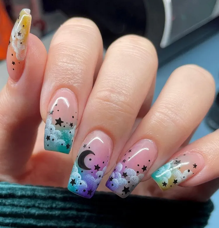 cloud nails with moon and stars decoration manicure inspiration for 2023
