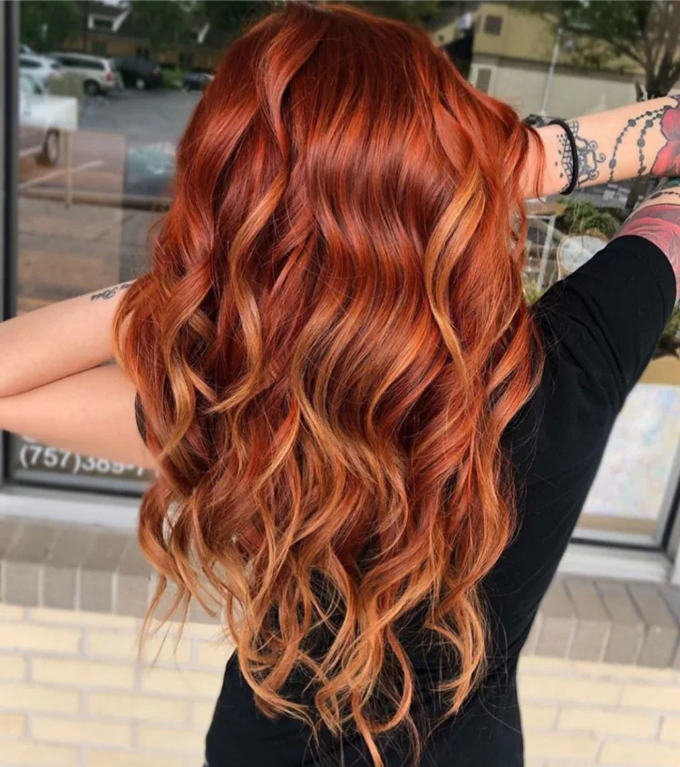 copper-red balayage trends 2023 long curly hair