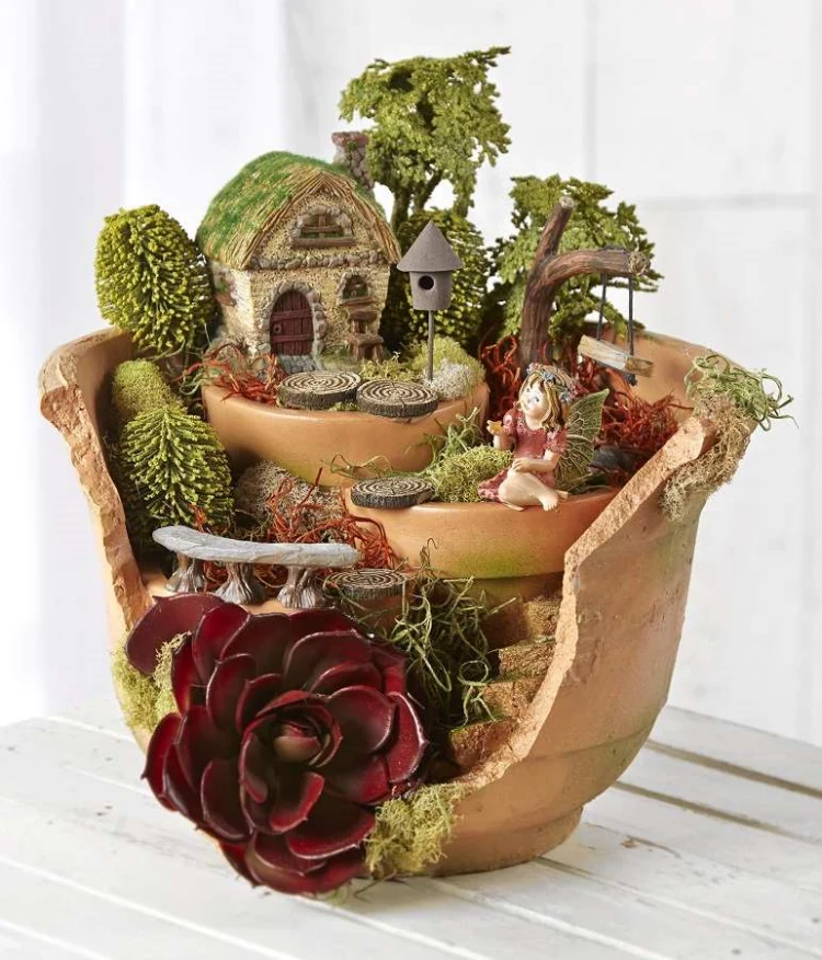 create a miniature garden in a broken pot