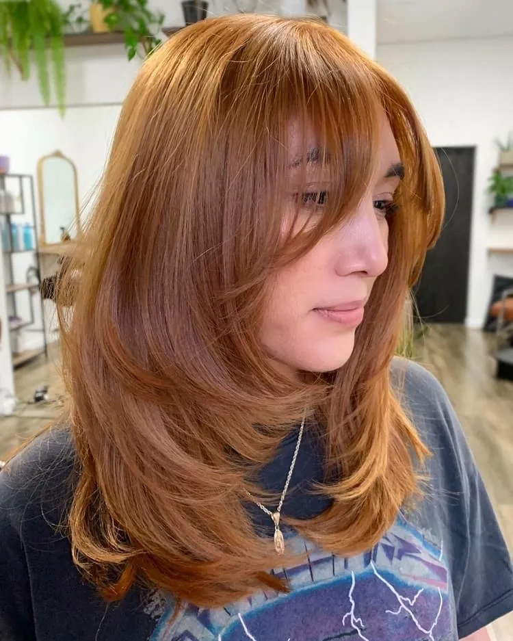 curve cut with bangs copper red hair