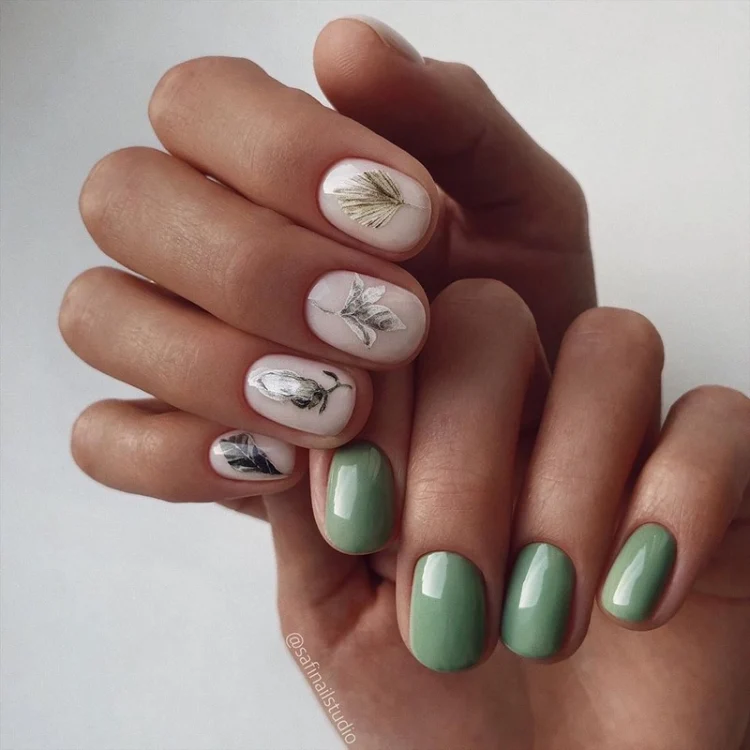 cute pastel greenish color and floral accents nail art