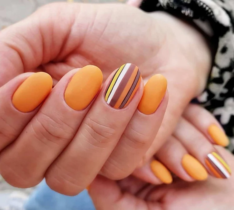 elegant orange matte nails and stripes March nails 2023