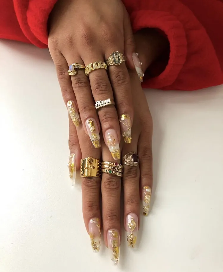 gold accents long stiletto nails maximalist design