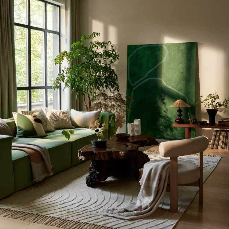 green accent sofa artwork plants beige living room decoration ideas