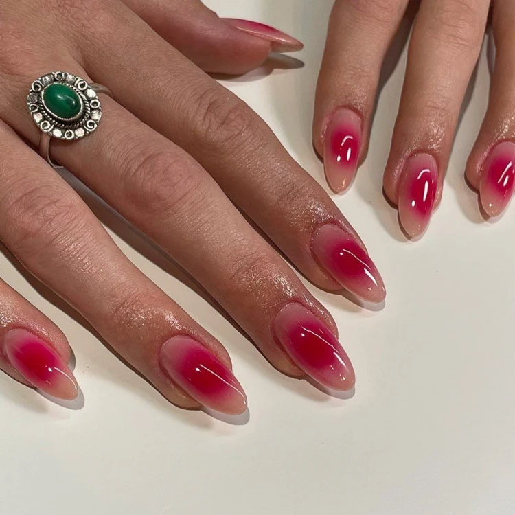 long almond shaped red and pink aura nails