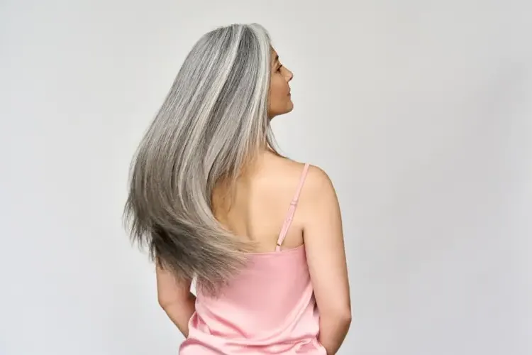 long silver hair women over 50 choosing the right haircut