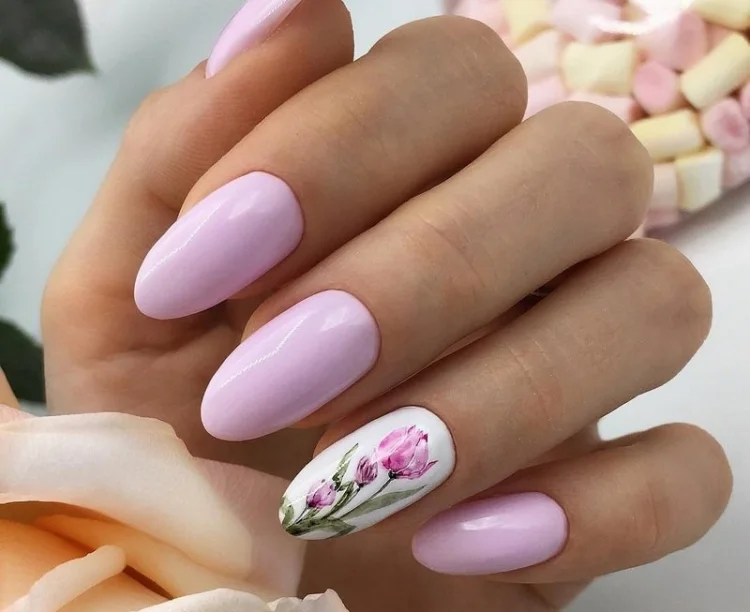 march nails 2023 beautiful light pink manicure with floral accents