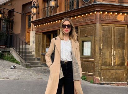 more relaxed silhouettes french girl outfit beige coat straight black trousers white shirt