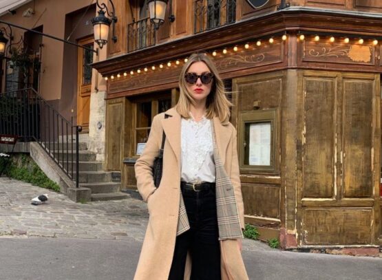 more relaxed silhouettes french girl outfit beige coat straight black trousers white shirt